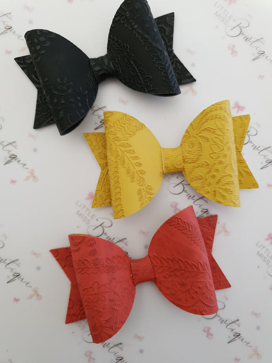Embossed Faux Leather Bows