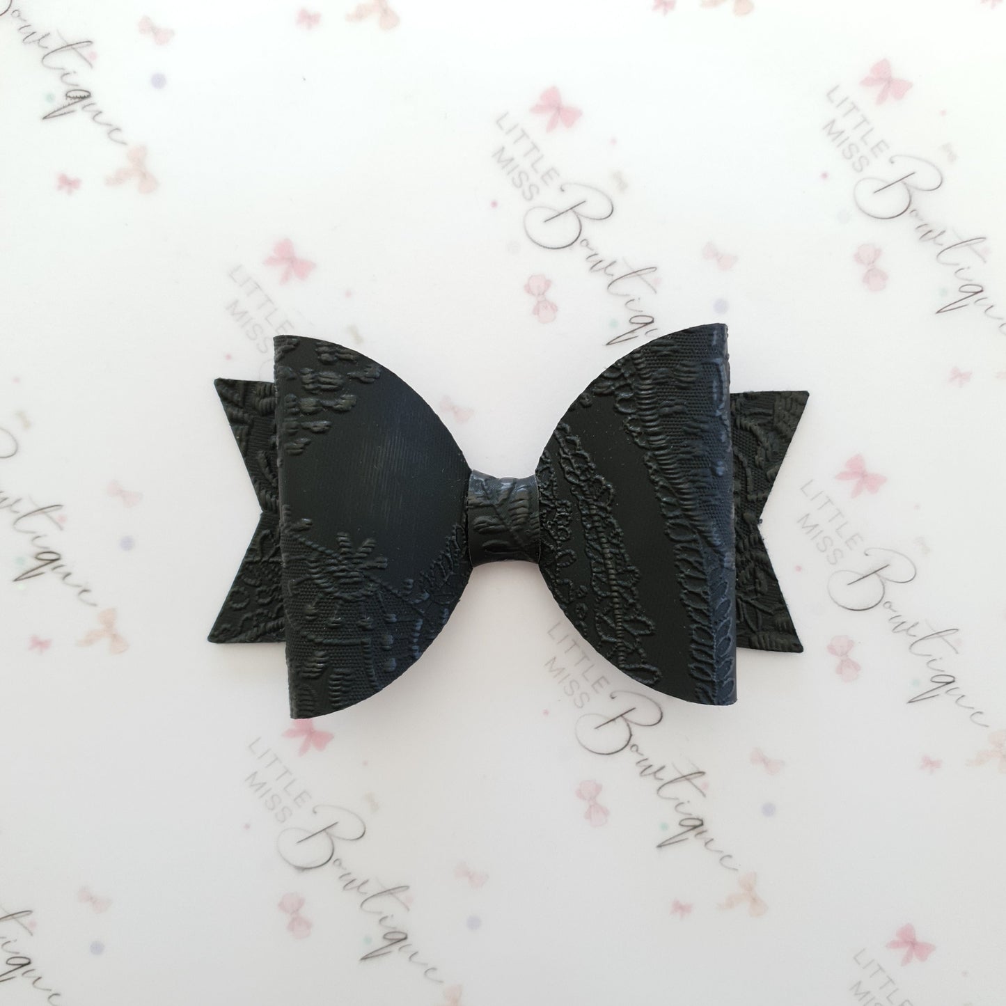 Embossed Faux Leather Bows