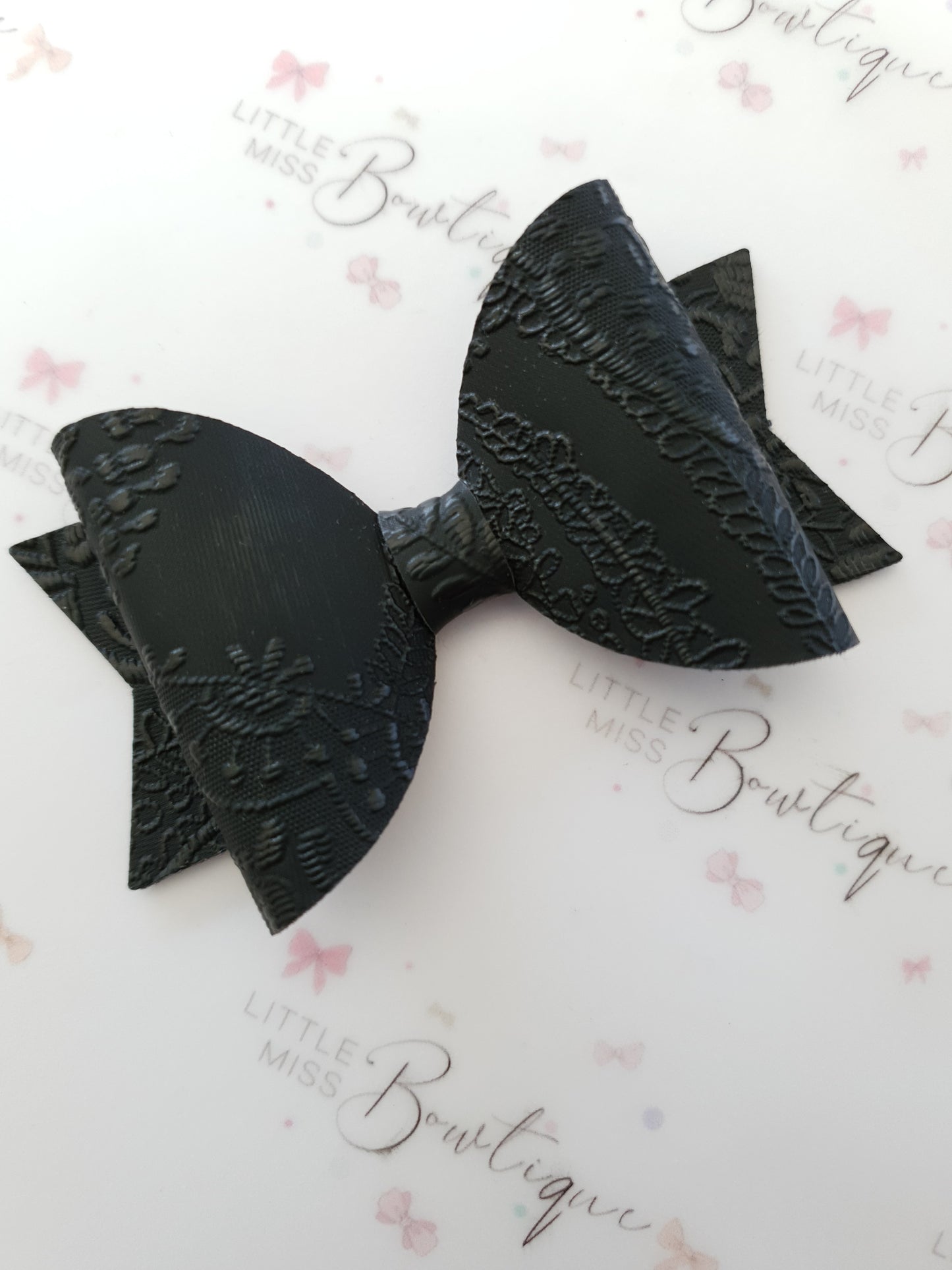 Embossed Faux Leather Bows
