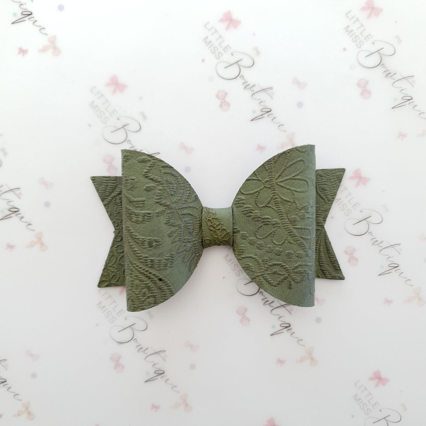 Embossed Faux Leather Bows