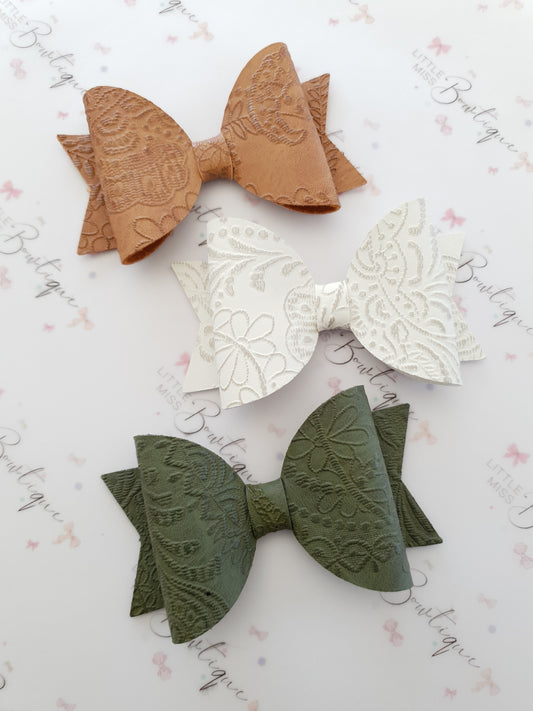 Embossed Faux Leather Bows