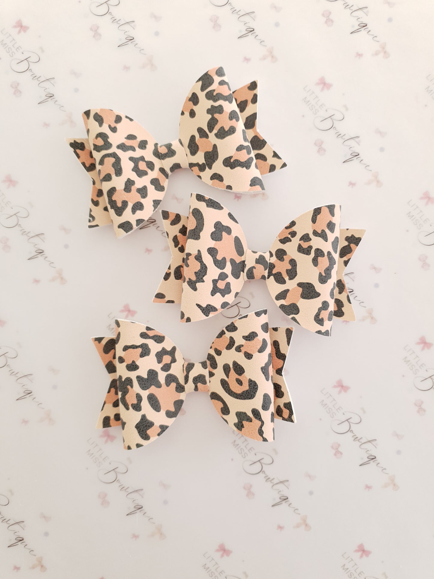 Suede Leopard Bows