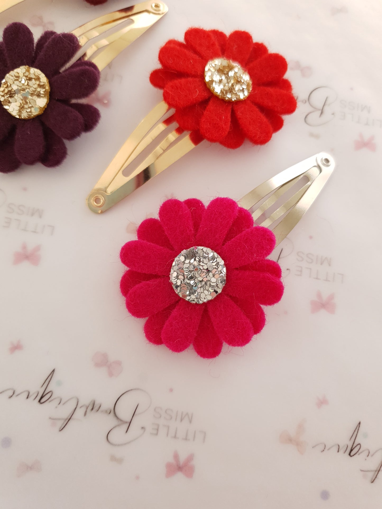 Maroon/Red Daisy Snap Clips