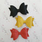 Embossed Faux Leather Bows