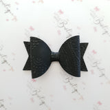Embossed Faux Leather Bows