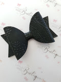 Embossed Faux Leather Bows