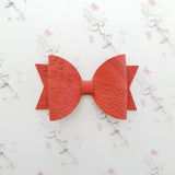 Embossed Faux Leather Bows