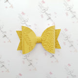 Embossed Faux Leather Bows