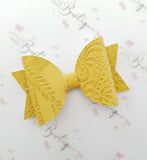 Embossed Faux Leather Bows