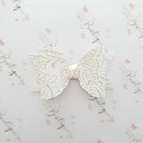 Embossed Faux Leather Bows