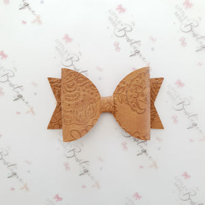 Embossed Faux Leather Bows