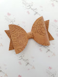 Embossed Faux Leather Bows