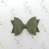 Embossed Faux Leather Bows