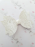 Embossed Faux Leather Bows