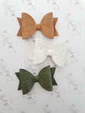 Embossed Faux Leather Bows