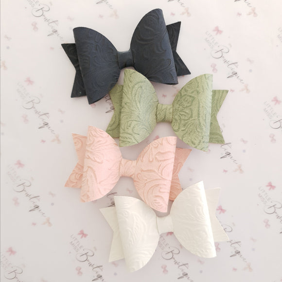 Vintage Embossed Faux Leather Bows