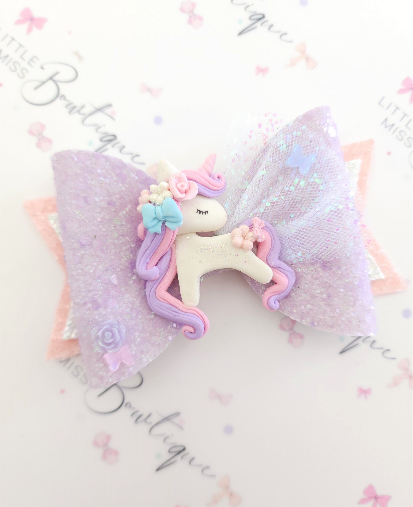 Sleepy Lilac Unicorn Bow